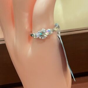 Moissanite And Sterling Silver Engagement Ring.